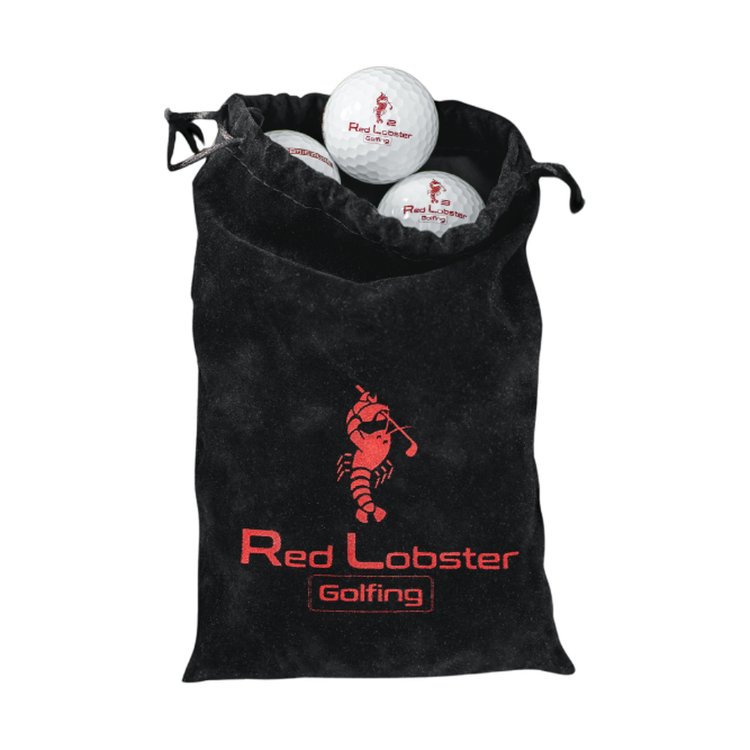 Schwarzes Samtsäckchen mit rotem Red Lobster Golfing Logo, gefüllt mit drei Lobbie PURE Golfbällen