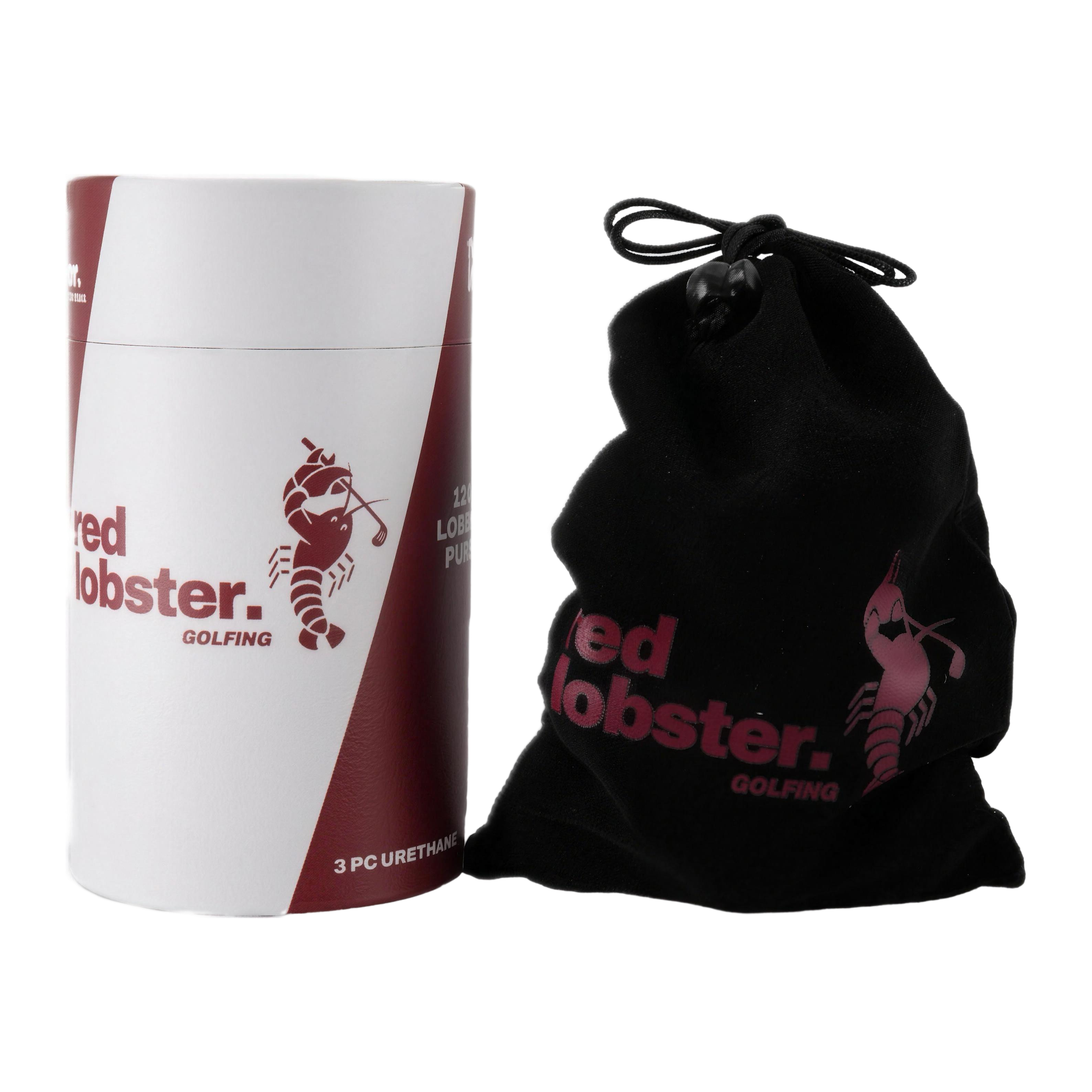 Lobbie PURE Dutzend-Zylinder mit Aufdruck „3 PC Urethane“ neben schwarzem Samtbeutel mit Red Lobster Golfing Logo